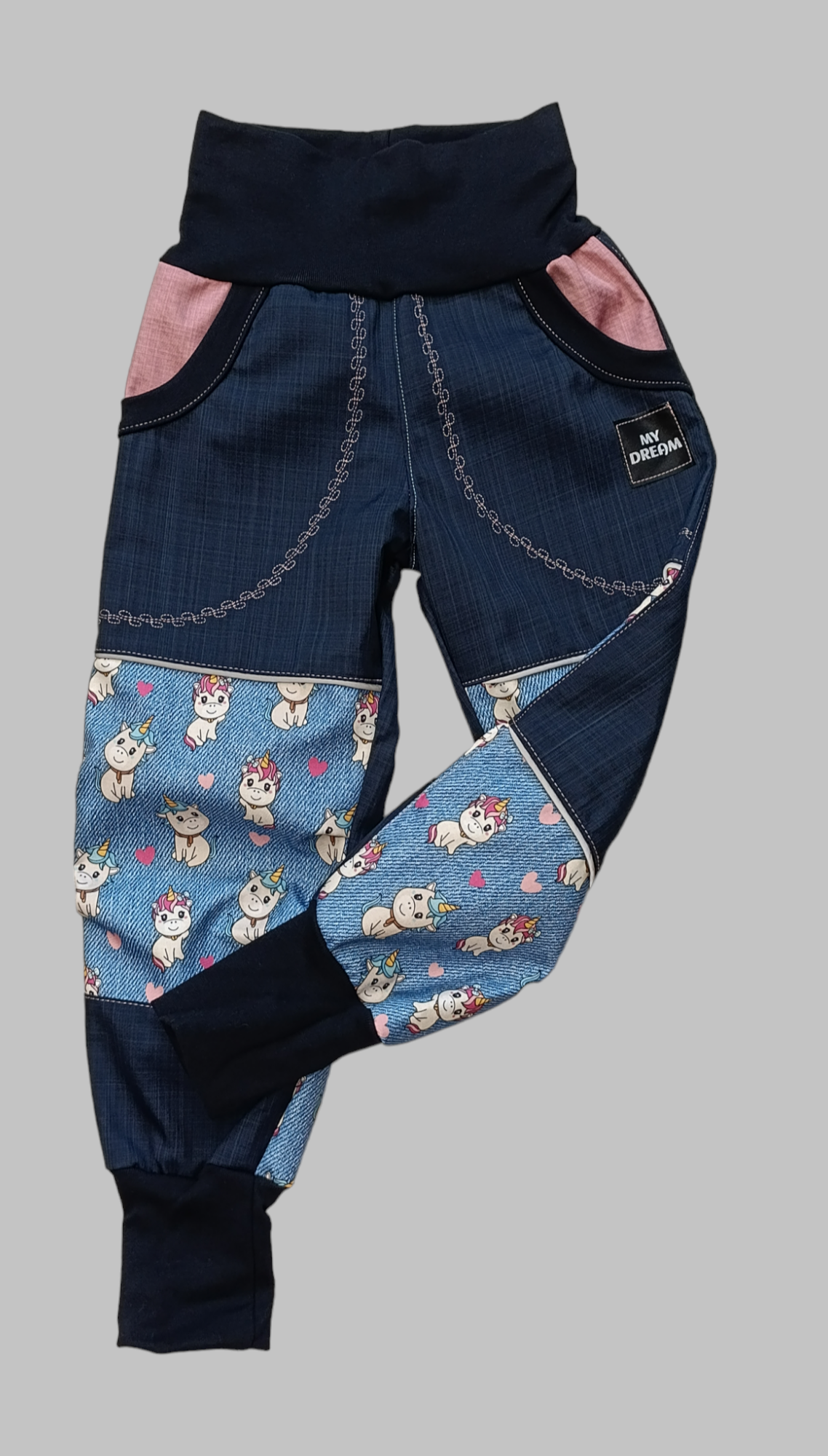 Kalhoty celoroční tmavě modré + jednorožci vel. 104